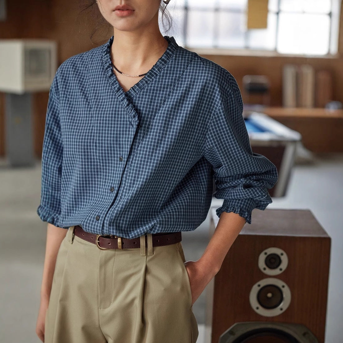 navy blue plaid V-neck ruffled long-sleeve shirt