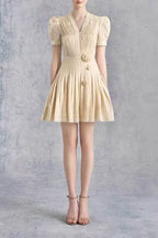 Woman wearing a beige dress 