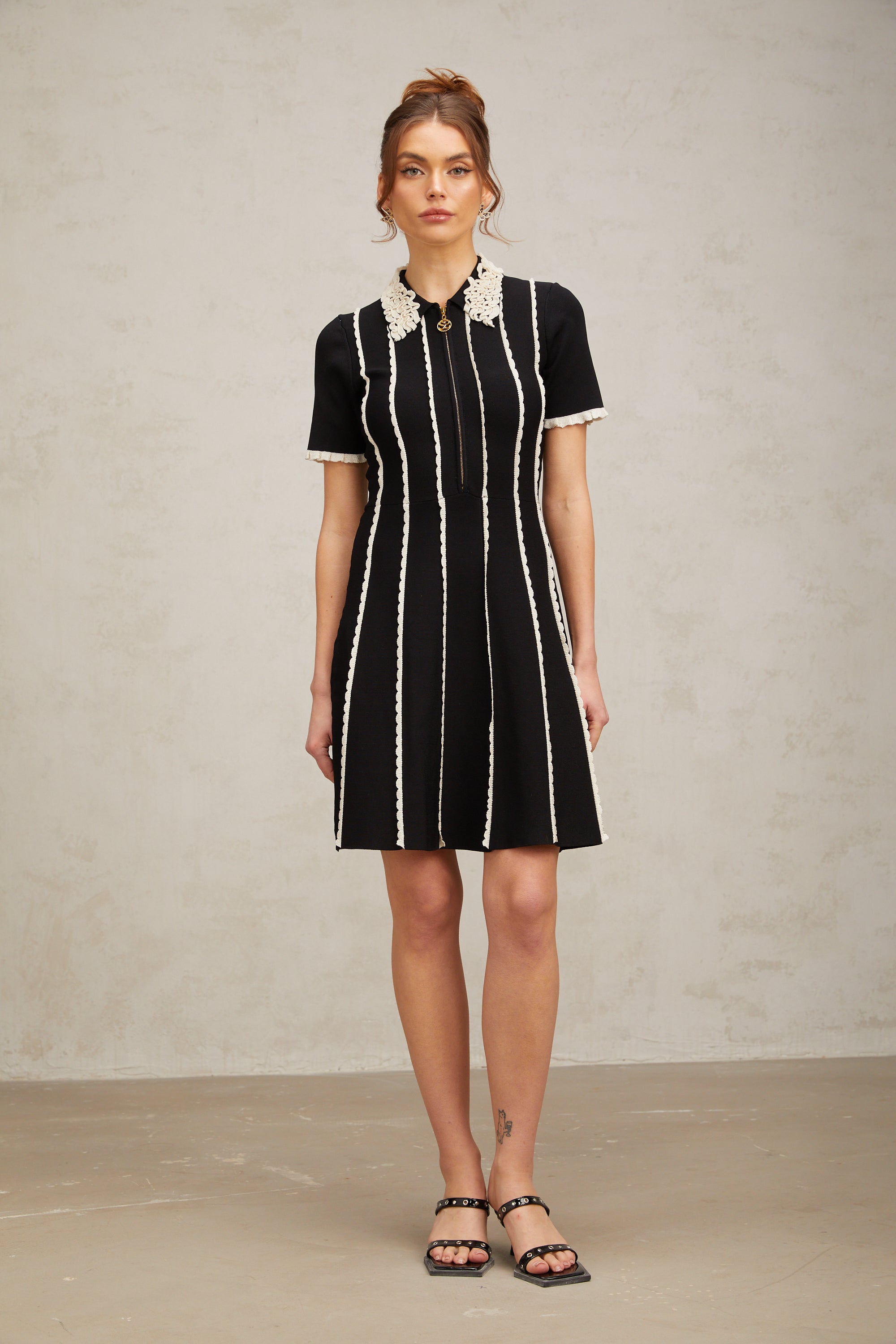 Flowering Girl Women Zazie black vertical-striped ruffle-trim knit mini dress