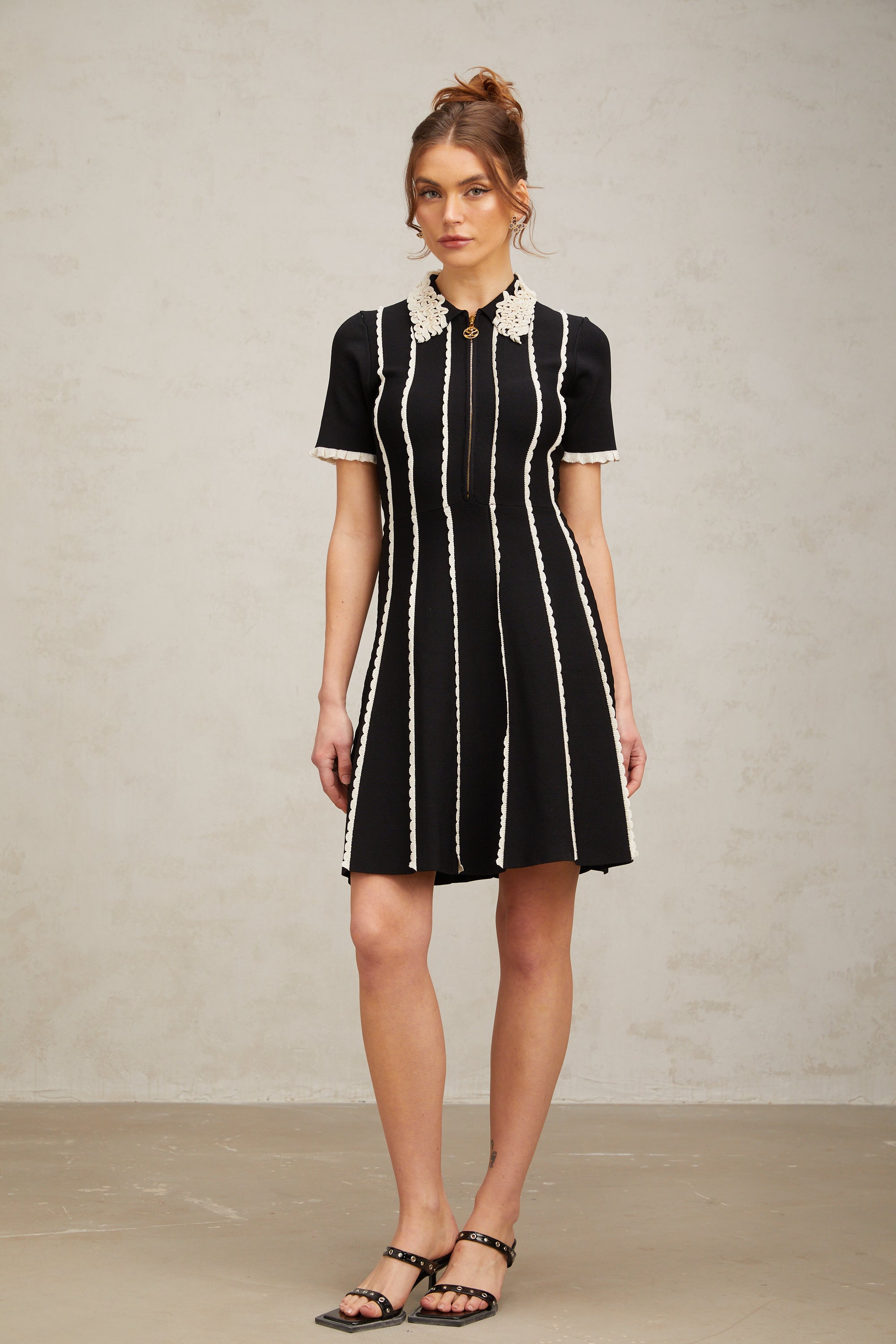 Flowering Girl Women Zazie black vertical-striped ruffle-trim knit mini dress