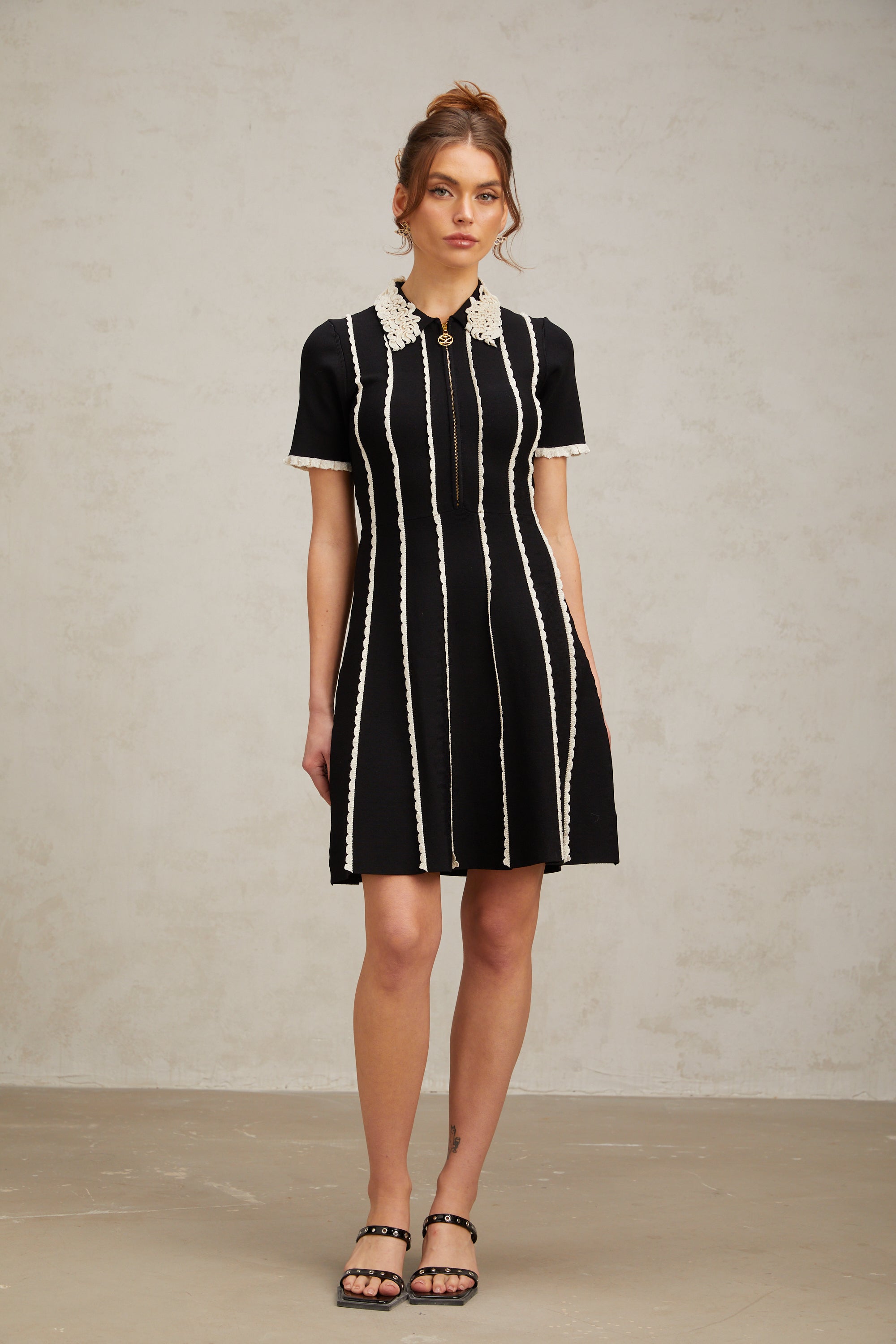 Flowering Girl Women Zazie black vertical-striped ruffle-trim knit mini dress