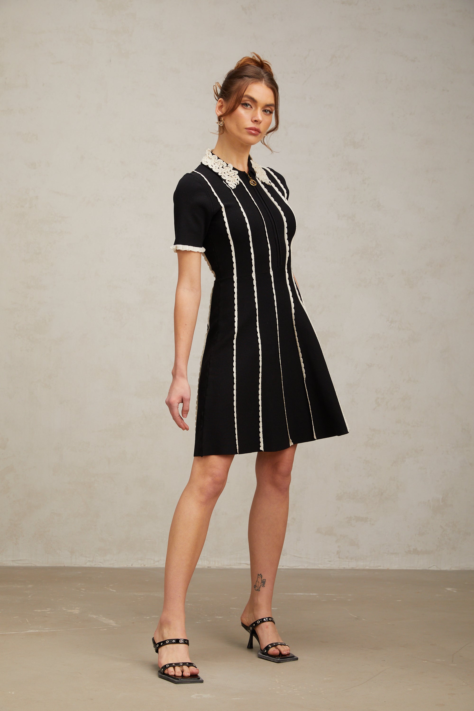 Flowering Girl Women Zazie black vertical-striped ruffle-trim knit mini dress