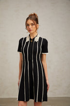 Flowering Girl Women Zazie black vertical-striped ruffle-trim knit mini dress