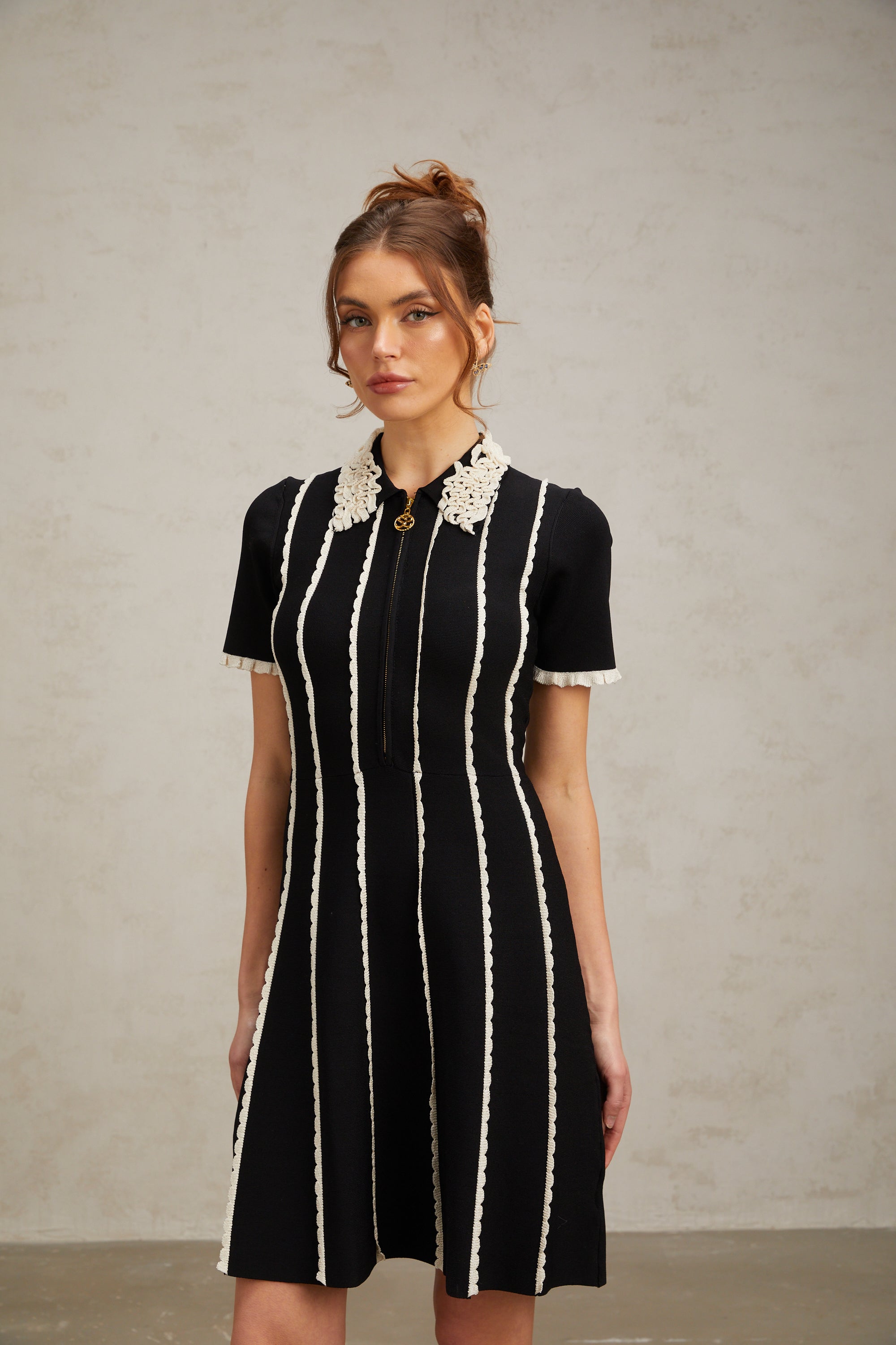 Flowering Girl Women Zazie black vertical-striped ruffle-trim knit mini dress