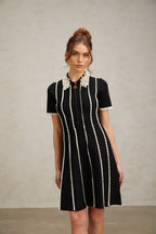 Flowering Girl Women Zazie black vertical-striped ruffle-trim knit mini dress