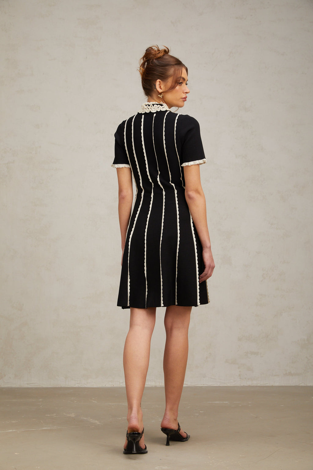 Flowering Girl Women Zazie black vertical-striped ruffle-trim knit mini dress