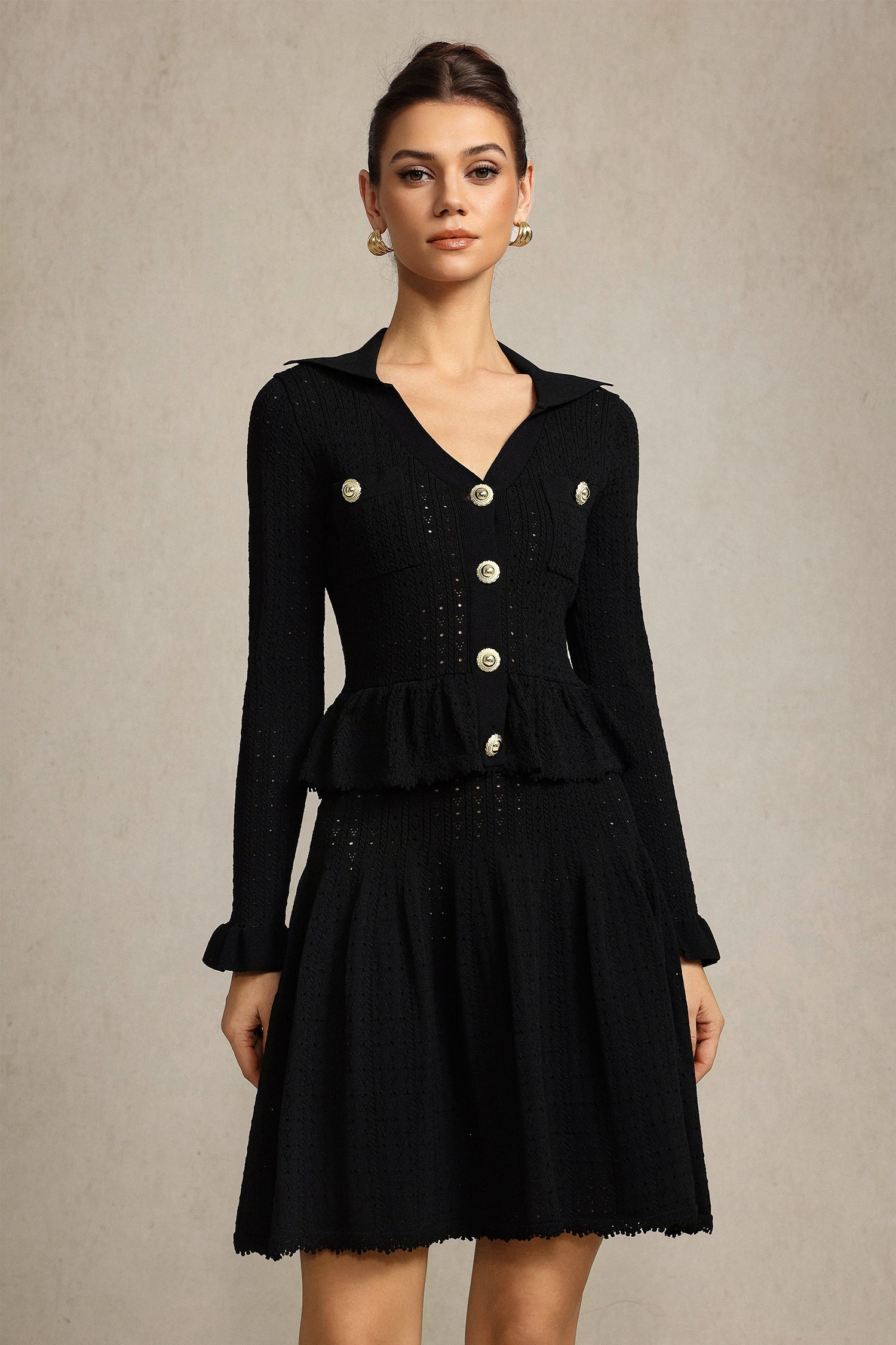 Leaf-edge paneled V-neck knitted mini dress in black