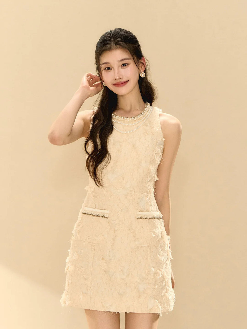 Pandora Feathery Sleeveless A-Line Mini Dress In Beige