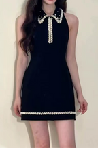 Flowering Girl Women pearl embellished gold chain splice mini dress in black