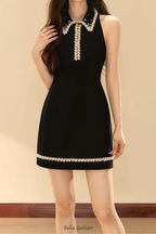 Flowering Girl Women pearl embellished gold chain splice mini dress in black