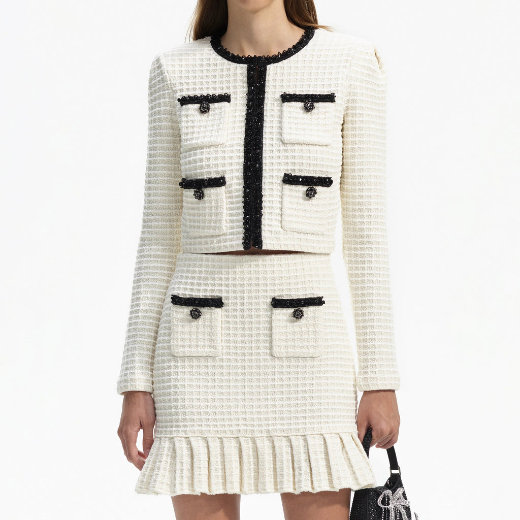 CREAM TEXTURED KNIT MINI SKIRT