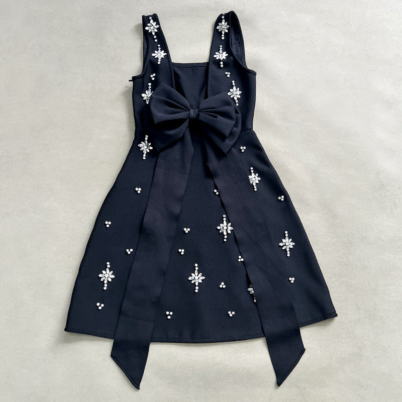 adora Sleeveless Diamond Bow Bandage Mini Dress in black