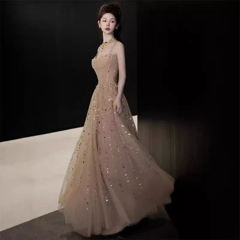 Nicola's Elegant Backless Halter Maxi Dress - Champagne