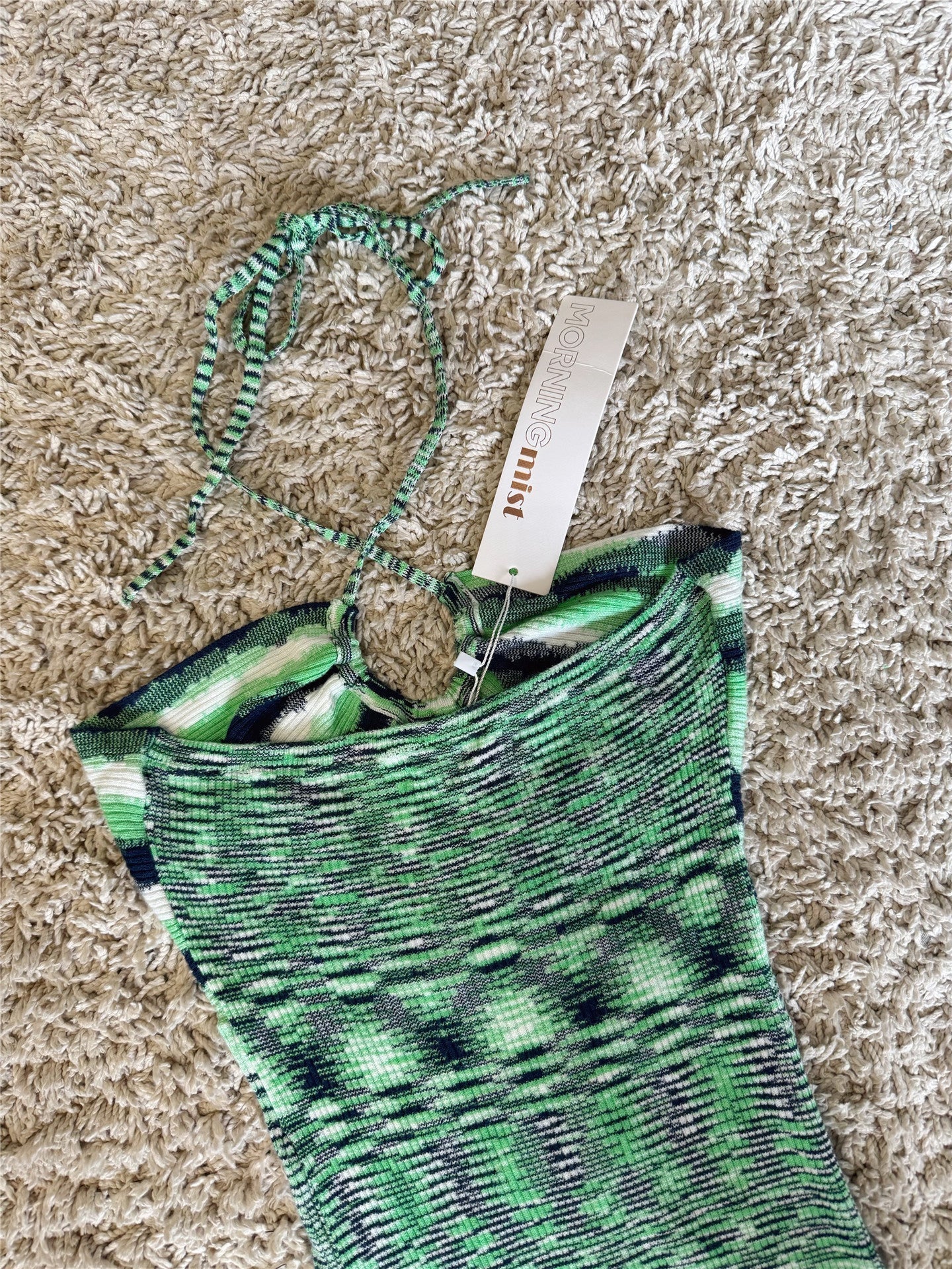 green knitted halterneck lace-up wrap dress