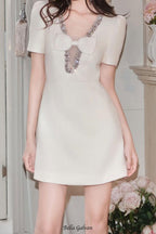 V-neck diamond chain bow mini dress in ivory