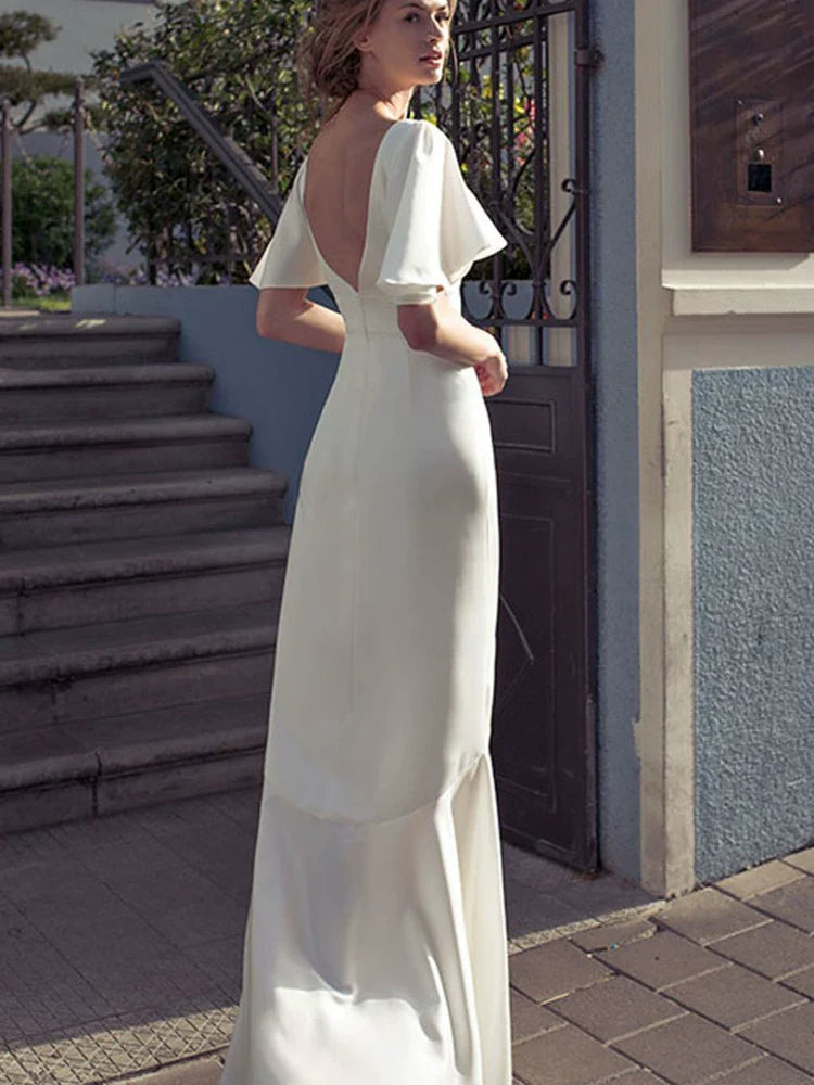 White irregular V-neck, backless long skirt, flared sleeves, elegant dress skirt, waist slimming, satin dress