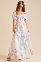 Puff-sleeved printed pleated lace strapless maxi dress
