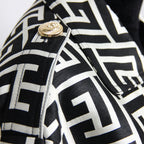 Flowering Girl Women black monogrammed trench coat