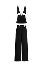 Black & White Halter Top with High-Waisted Wide-Leg Pants
