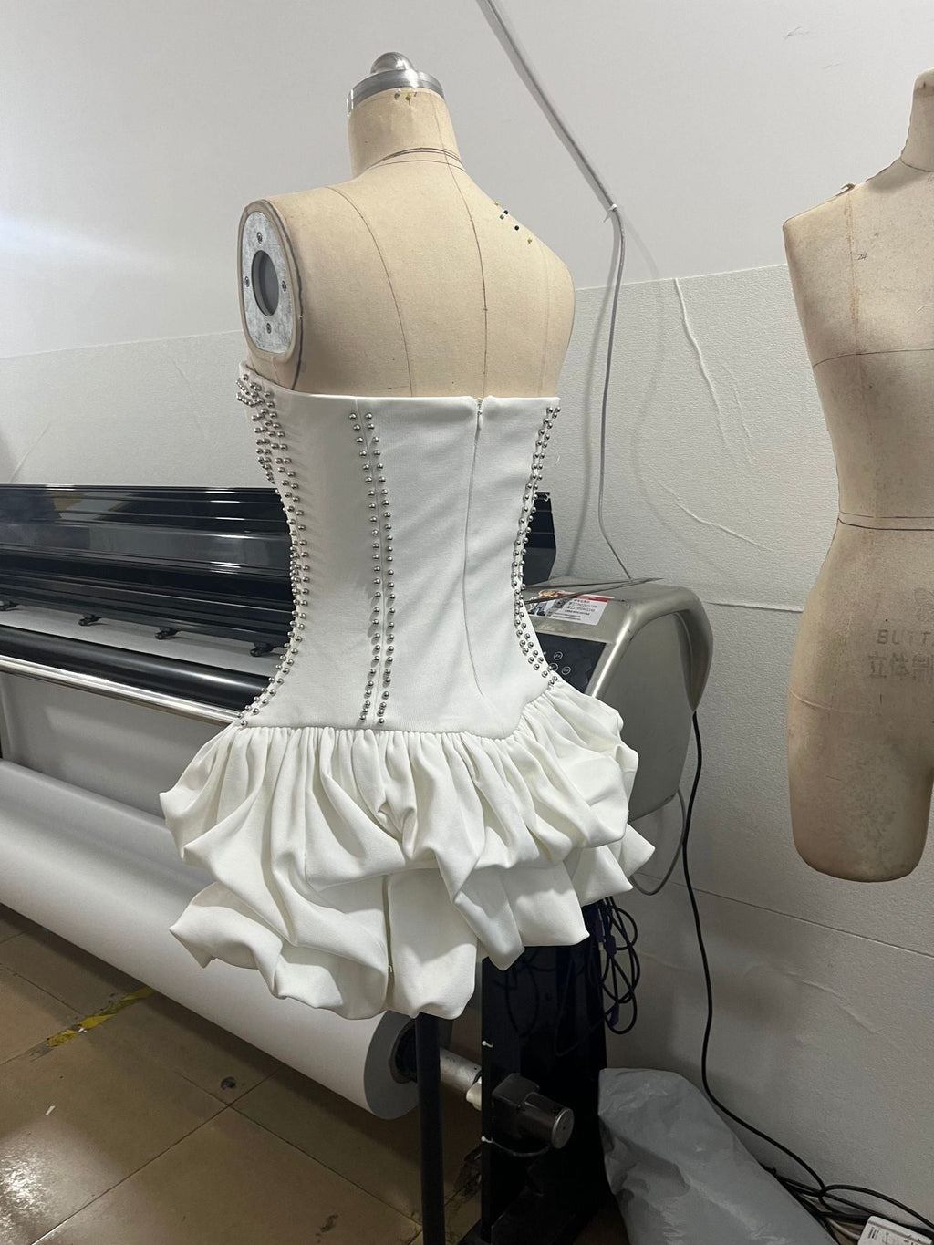 regina strapless puffy mini dress in off-white