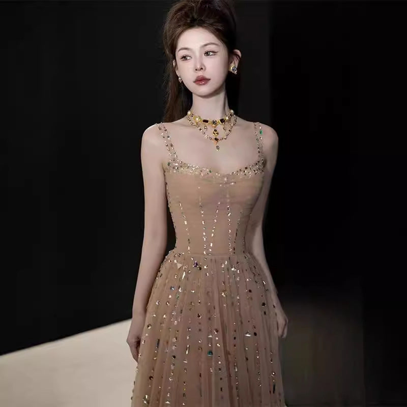 Nicola's Elegant Backless Halter Maxi Dress - Champagne