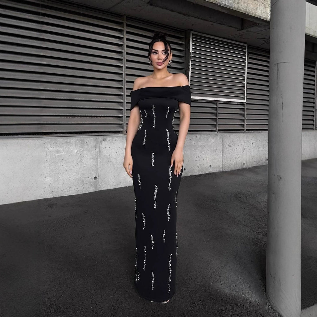 Laurel Off-Shoulder Rhinestone Bandage Maxi Dress In Black