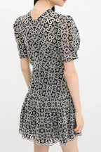 black v-neckline Guipure Mini Dress