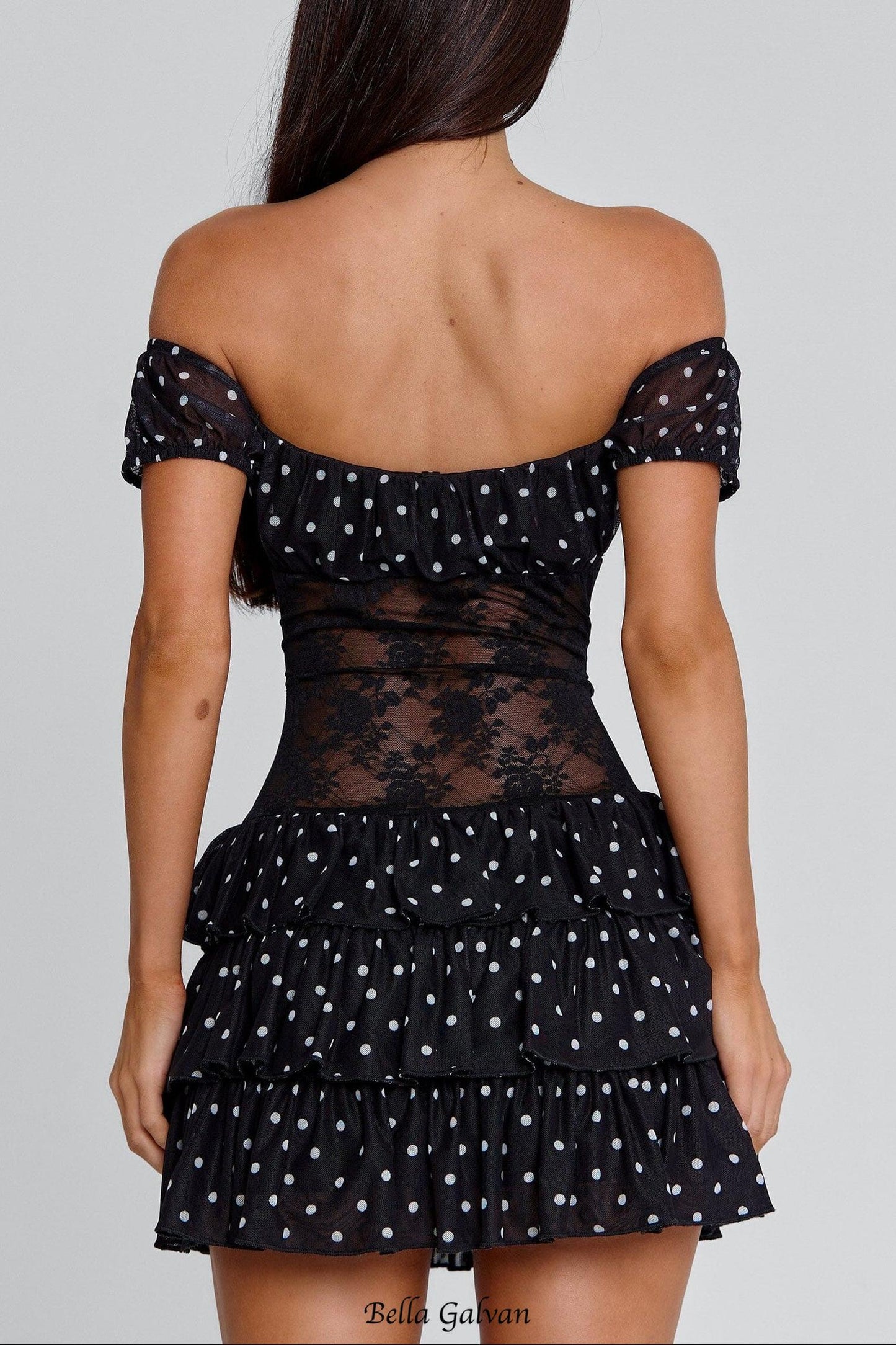 hedda Lace-trimmed polka dot strapless mini dress in black