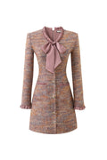 xylia bow v-neck long sleeve mini dress in multicolor
